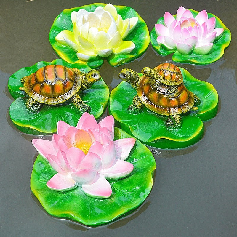 Turtle resin ornaments floating on the water surface