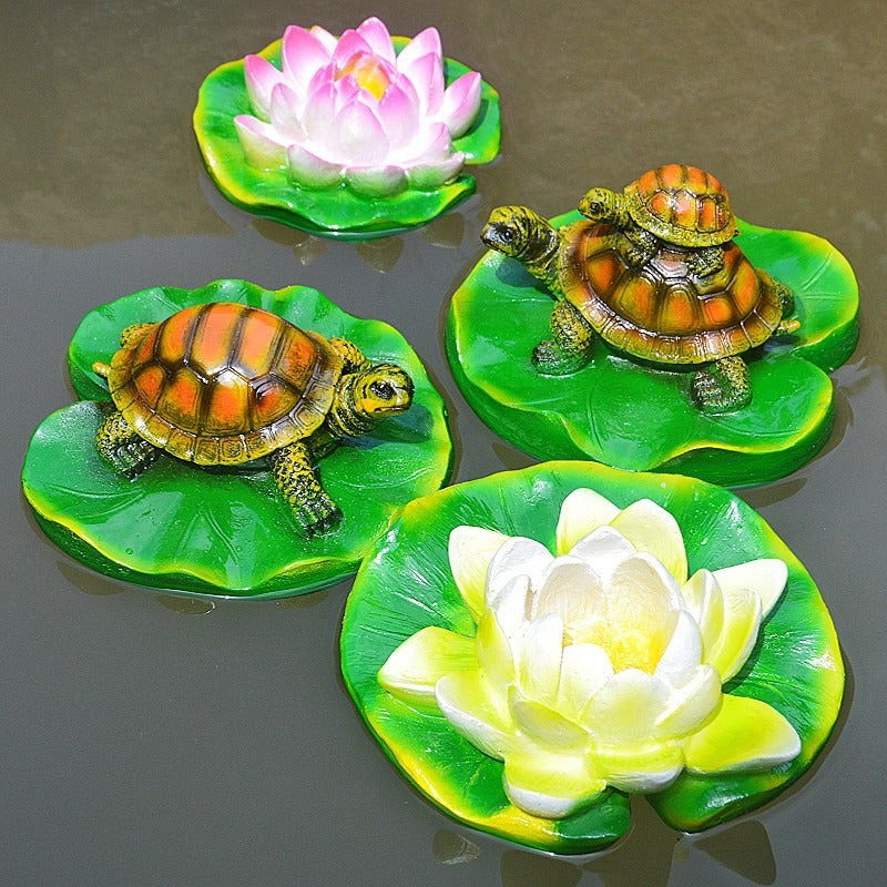 Turtle resin ornaments floating on the water surface