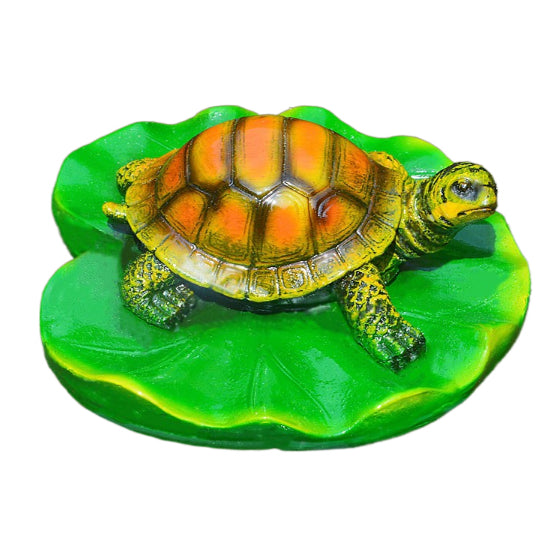 Turtle resin ornaments floating on the water surface