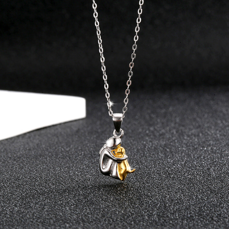 S925 sterling silver little girl and dog embrace necklace for women fashionable and simple contrasting color collarbone chain