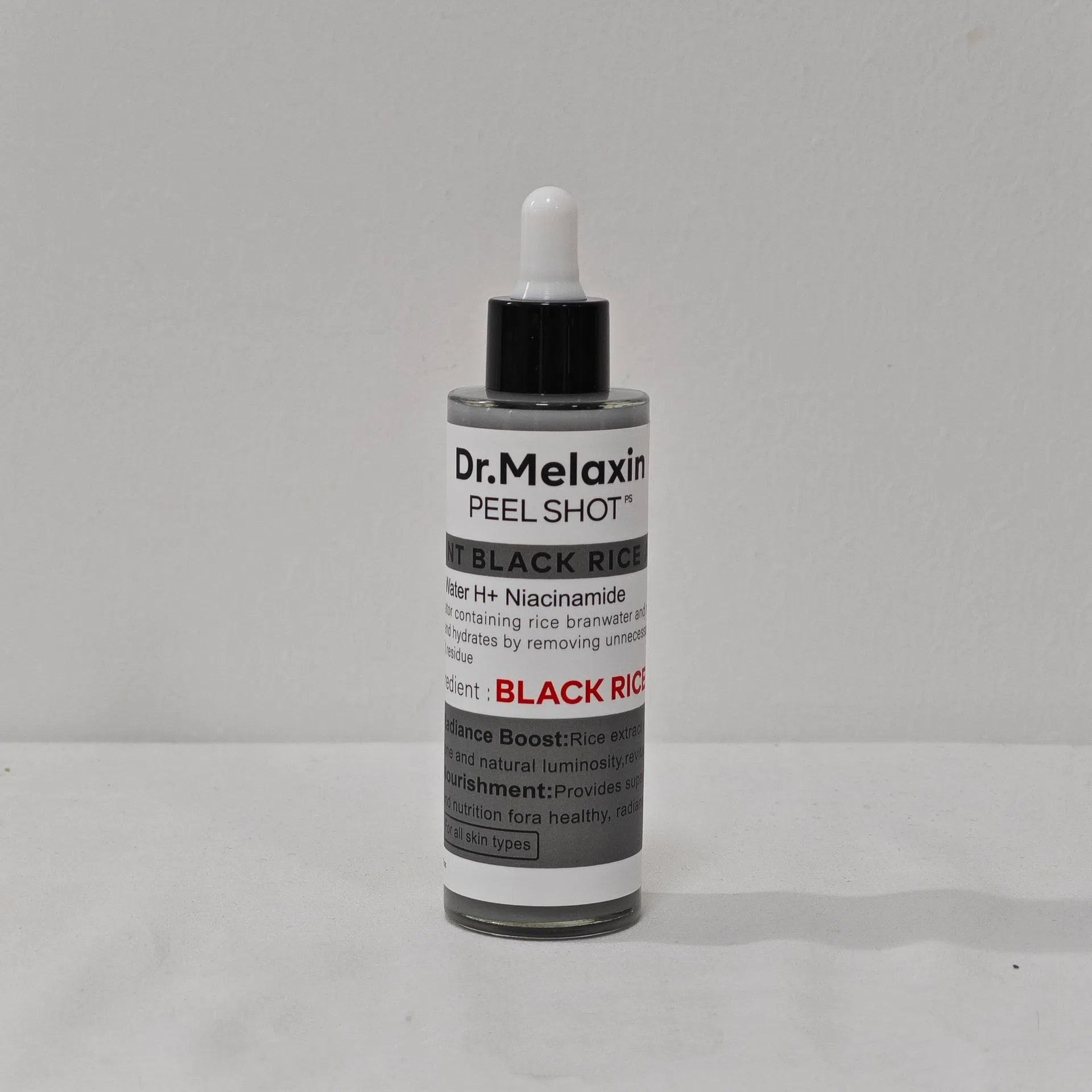 White and black rice peeling essence