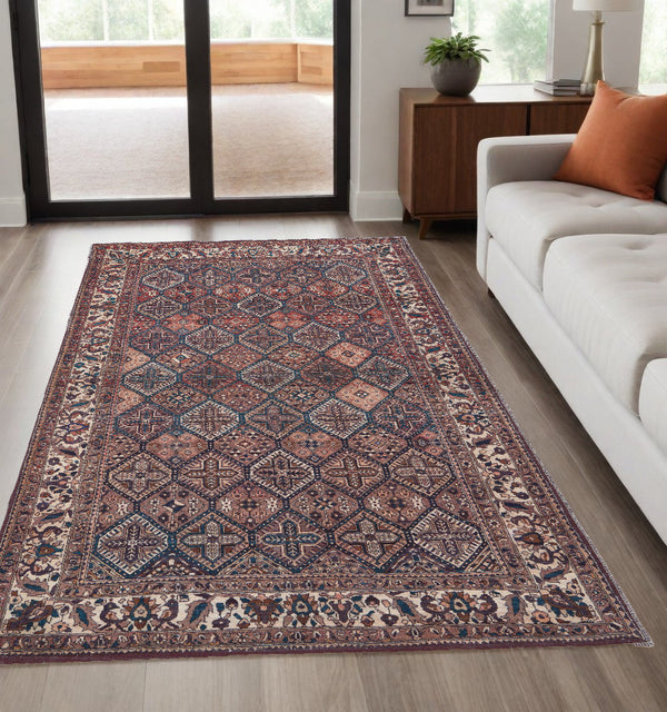 10' X 14' Ivory and Blue Floral Power Loom Area Rug