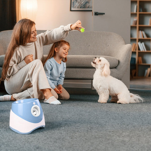 Rechargeable automatic tennis ball launcher for pets. Includes 3 balls, promotes interactive play.