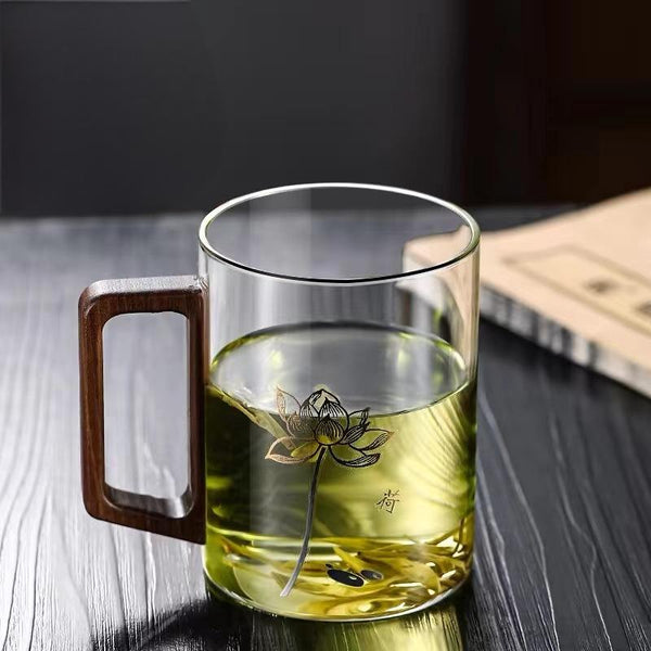 High end green tea cup with walnut handle and lid. High temperature resistant glass office drinking cup
