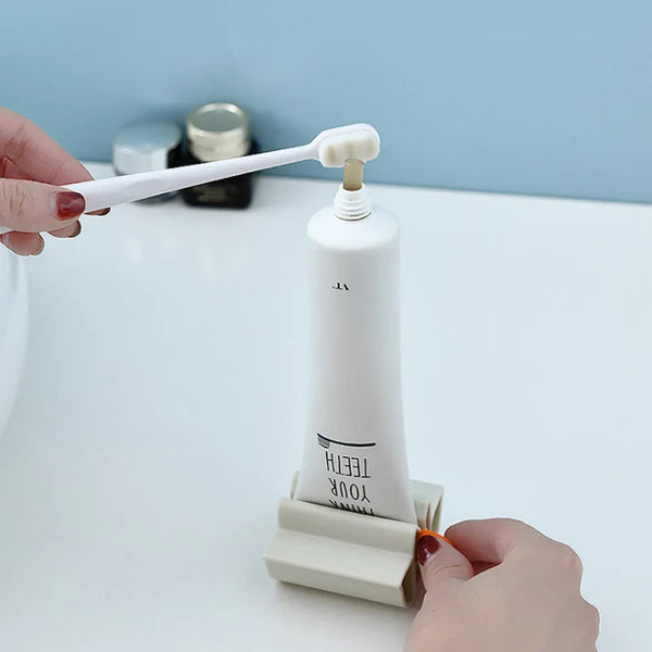 New Bathroom Accessories Toothpaste Squeezer Tooth Paste Dispenser Tube Squeezer Facial Cleanser Press Rolling Holder for Kids