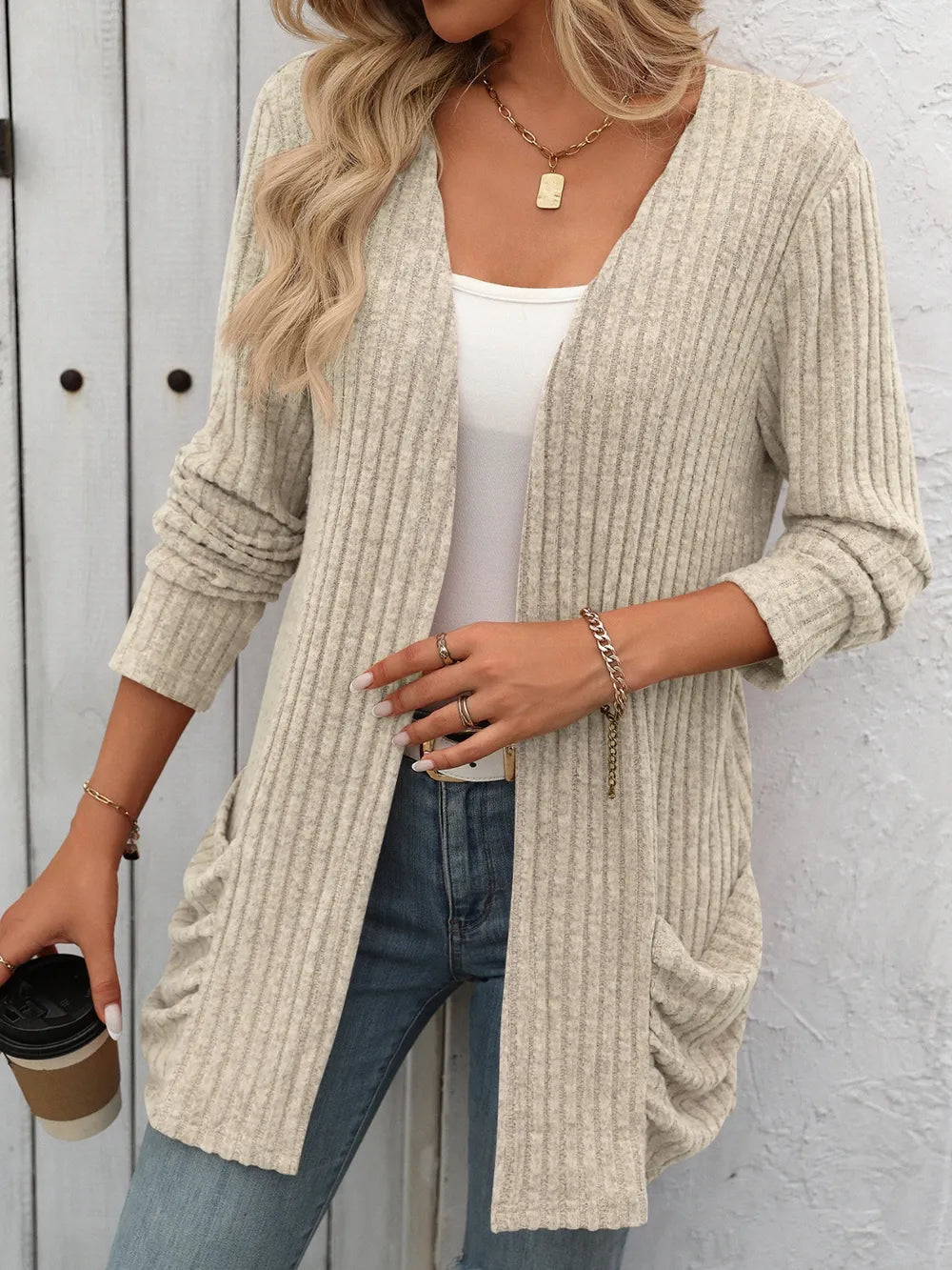 Autumn and winter new solid color pit stripe brushed pocket cardigan long sleeved jacket for women