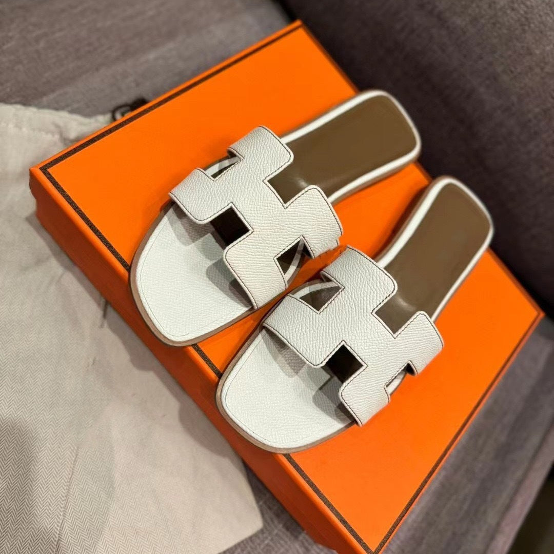 Flat bottomed beach sandals are fashionable casual lightweight and can be worn as a single drag