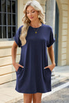 Solid color round neck pocket loose short sleeved dress