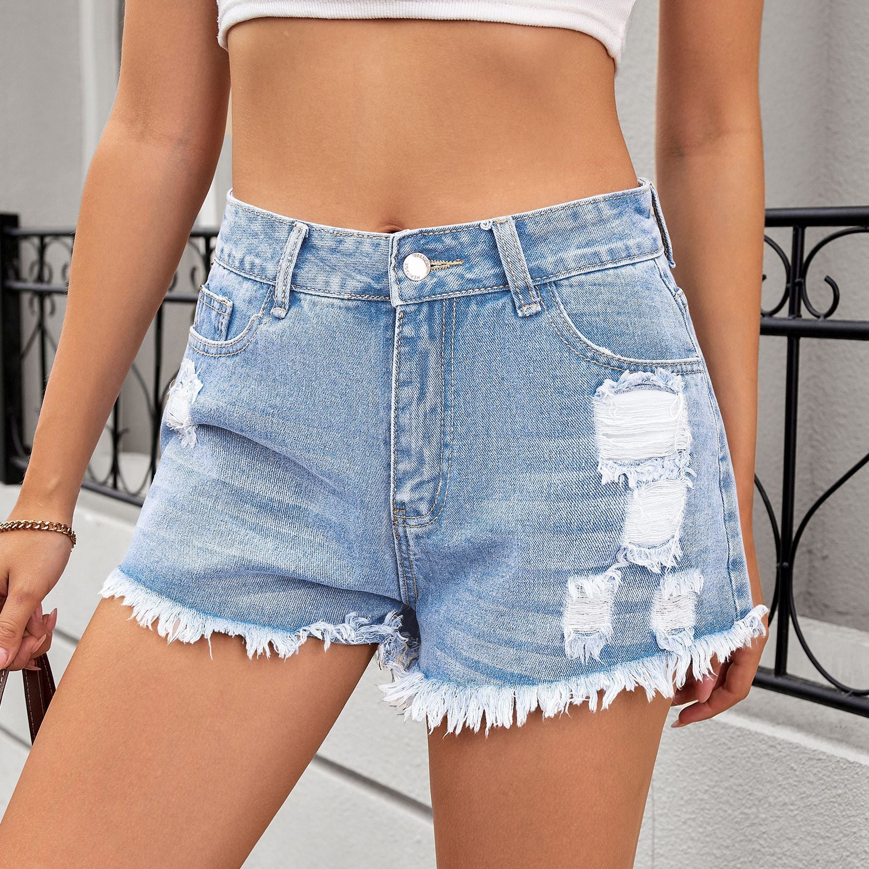 Women's ripped denim shorts and hot pants